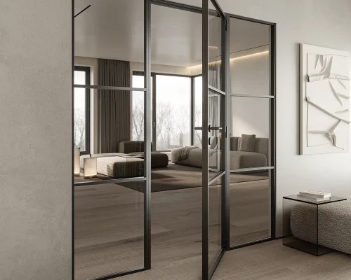Elegante Industrietür aus Stahl und Glas für lichtdurchflutete Wohnräume