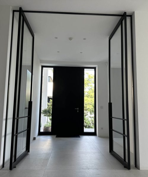steel-interior-projekt-melle-windfang-doppeltür-pivot-tür-4