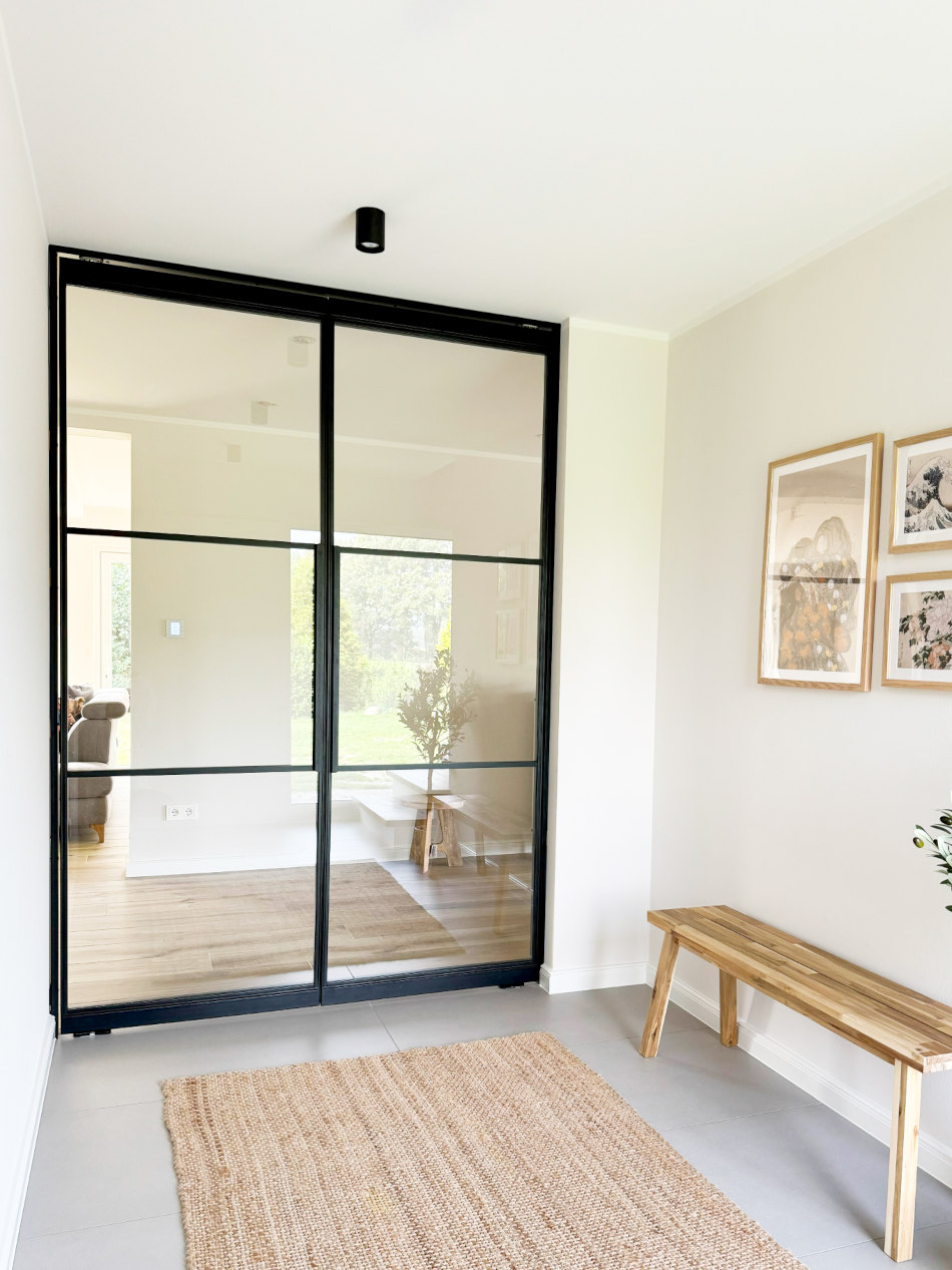 steel-interior-projekt-garrel-flur-wohnzimmer-doppeltür-pivot-tür-2