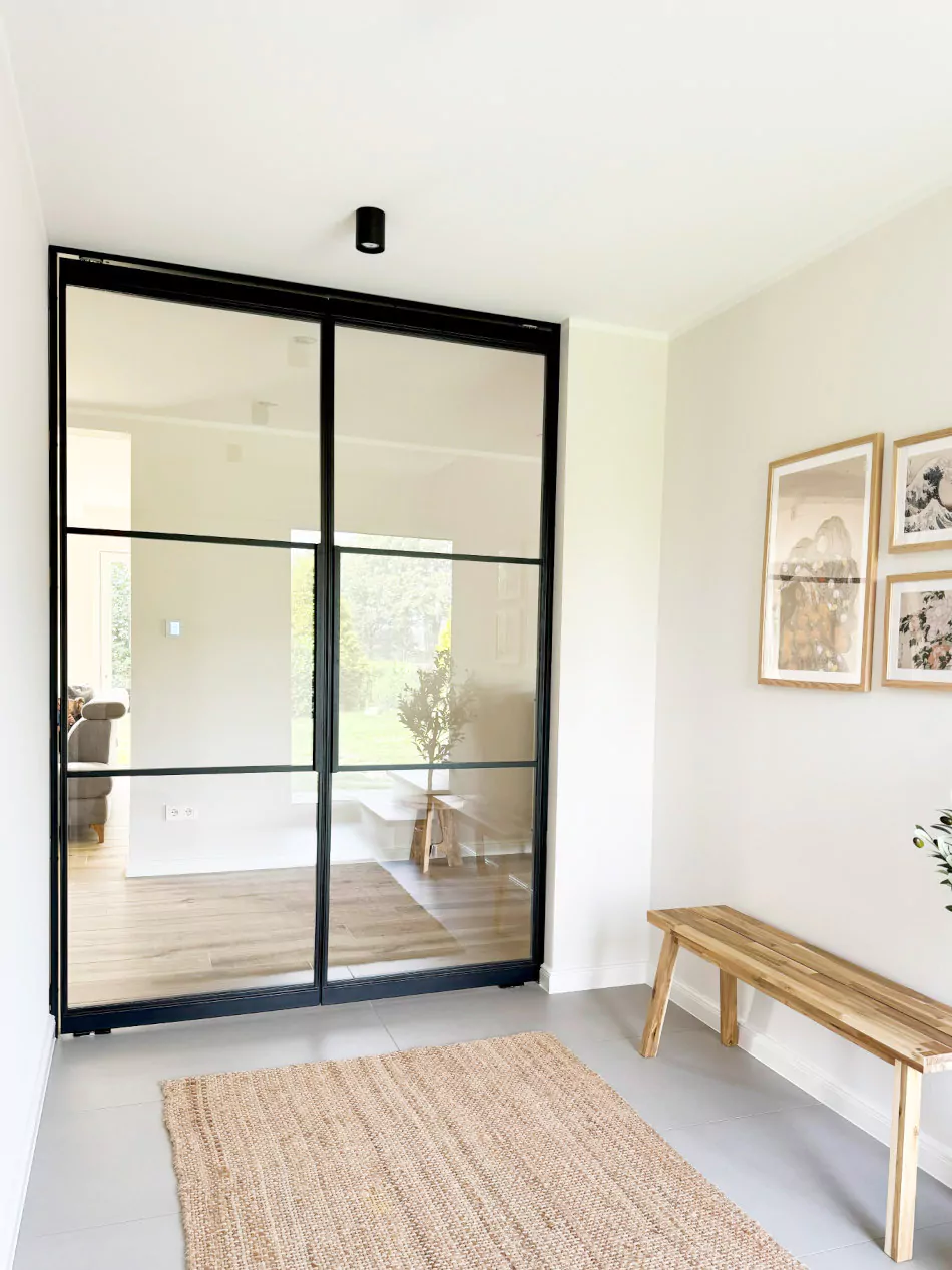 steel-interior-projekt-garrel-flur-wohnzimmer-doppeltür-pivot-tür-2