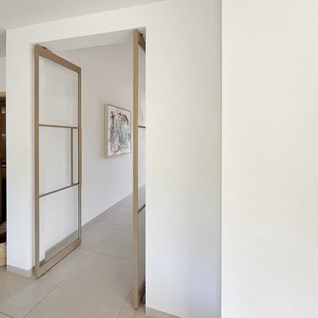 steel-interior-projekt-hamburg-flur-wohnzimmer-doppeltür-pivot-tür-windfang-5